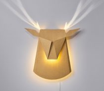 Faux Deer Head Wall Lighting: Ambient lighting with a twist. This cardboard deer looks like a doe when the light is turned off, but fantastic antlers are revealed with the flip of a switch. It's a cool illusion for any home. This would make a wonderful light for a nature-themed nursery!