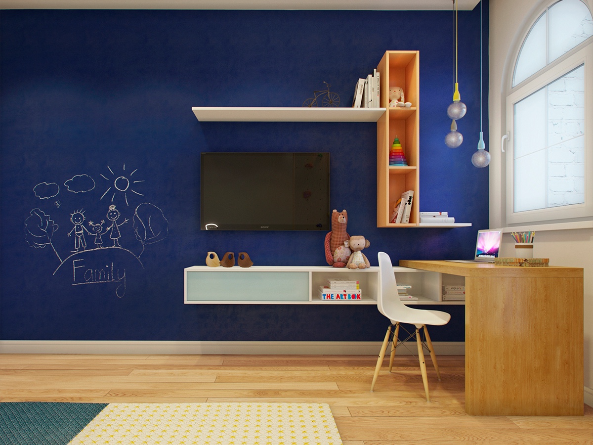 The children’s room allows creativity – within good design. Midnight blue from the bedroom duvet translates to a feature chalkboard wall, for the kids to draw on.