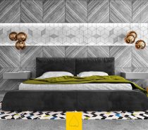 Patterned to perfection, this grey bedroom uses stripes, hexagons and concrete to provide a canvas for autumnal hues. Bronze bauble lights and olive green are set upon by pops of yellow, blue and black in a rug and ornaments.
