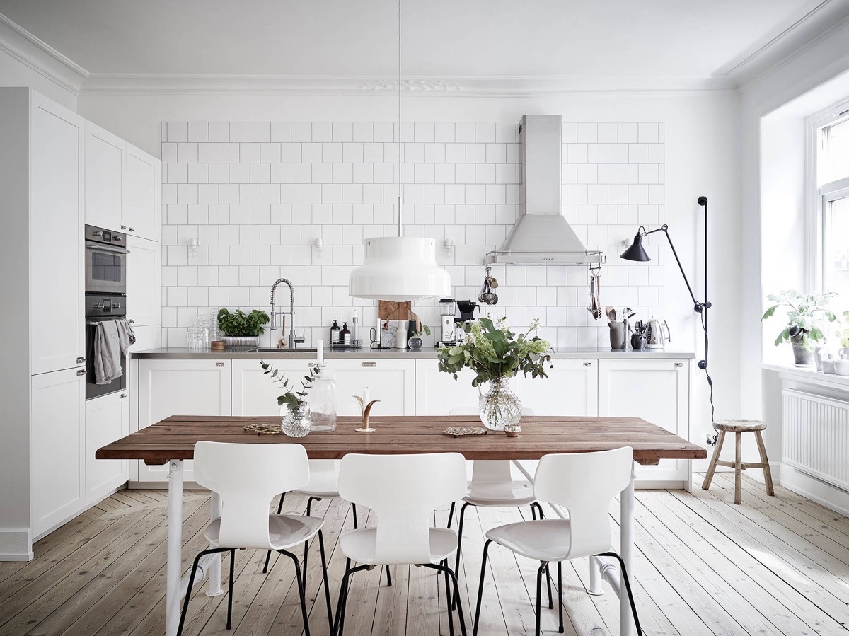 contemporary kitchen with white brick wall