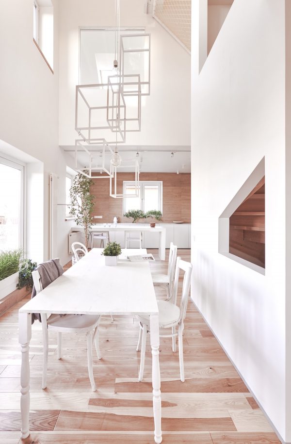 A White and Wood House for a Stylish Family