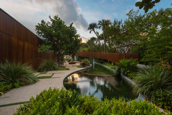 A Luxury Miami Beach Home With Pools, Natural Lagoons, And A Rooftop Garden