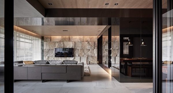 Black Acrylic, Glass and Stone Form This Dark and Sophisticated Apartment Interior