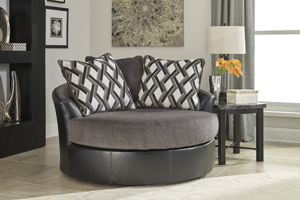 black leather grey upholstery oversized round swivel chair | Interior