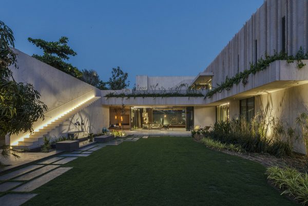 Cross Shaped Modern Home In Peaceful Landscaped Gardens