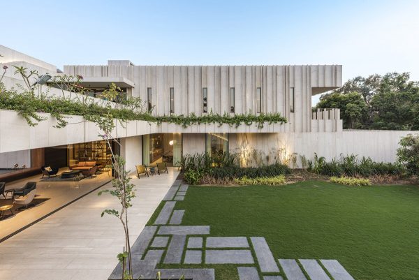 Cross Shaped Modern Home In Peaceful Landscaped Gardens