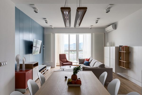 Two Punchy Modern Apartments With Red And Blue Decor