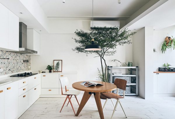 Bright Apartment With Clean White Decor, Wood Accents & Green Plants