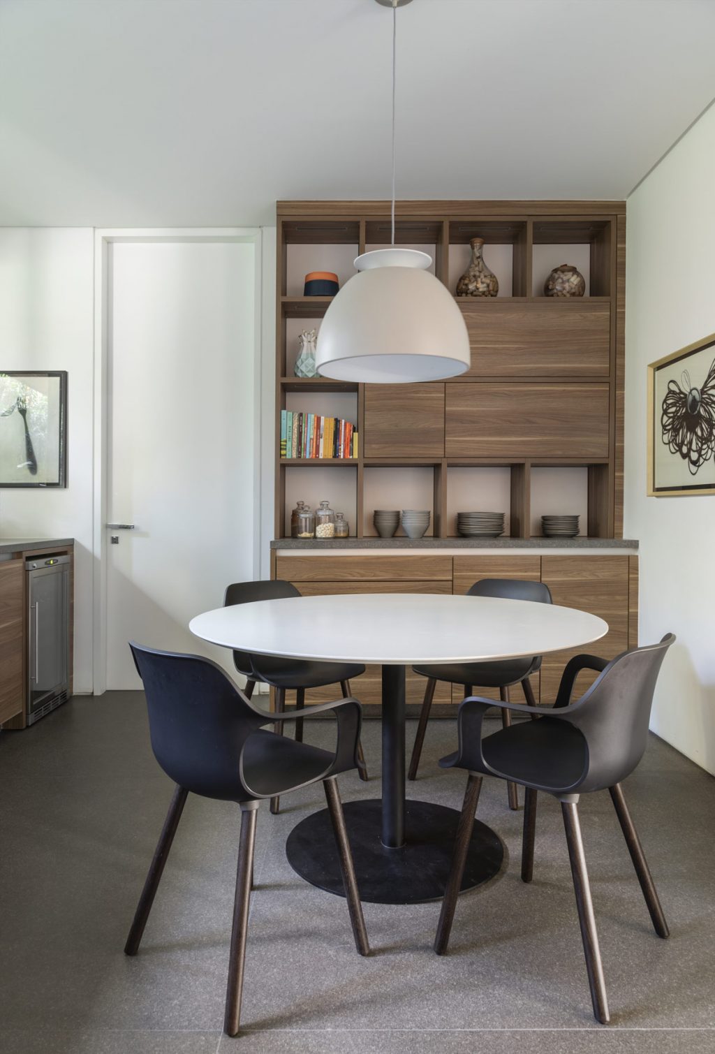 dining room pendant light over round dining table | Interior Design Ideas