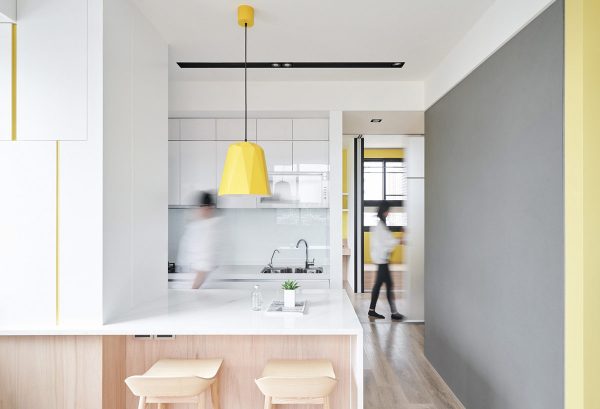 Small Interiors Made Airy With White And Yellow Decor And Space Saving Solutions