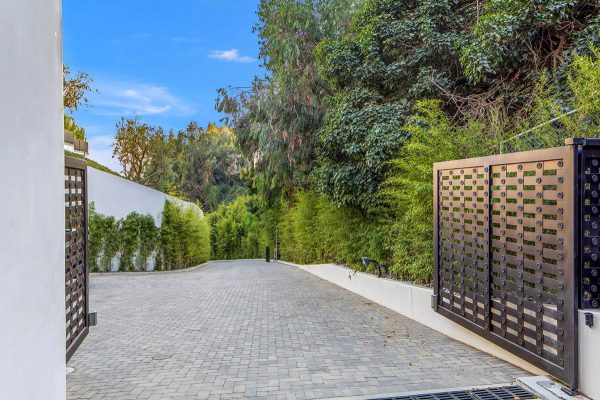 A Beverly Hills House With A Dinosaur Skeleton Is For Sale