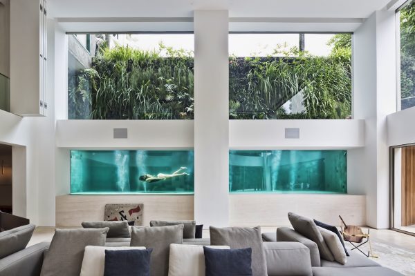 A Brazilian Art Collector’s Home With A Luxurious Glass Swimming Pool