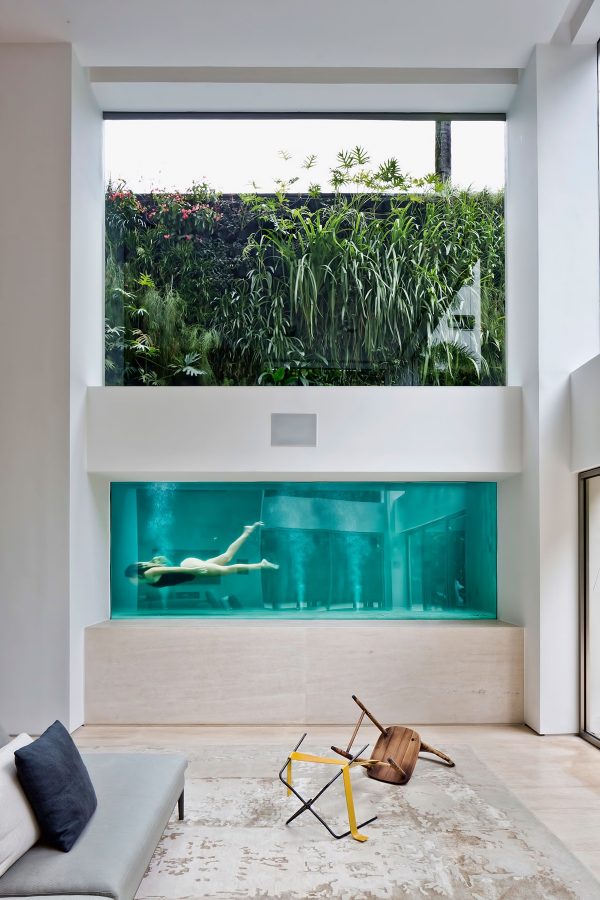 A Brazilian Art Collector’s Home With A Luxurious Glass Swimming Pool