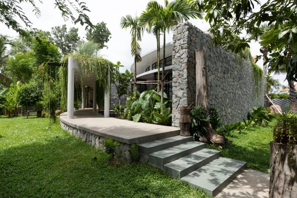 Lush Tropical House Surrounded By Nature