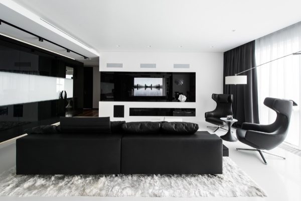 40 Black Couch Living Rooms With Tips To Help You Decorate Yours