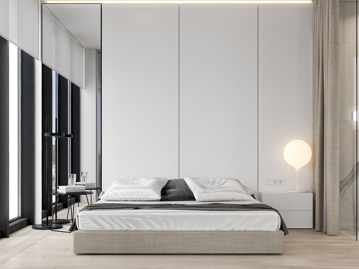 More masculine bedrooms can create calm in colour contrast. Using white, high panelling and an idea-balloon side light, black and grey stripe the room in simple furnishings.