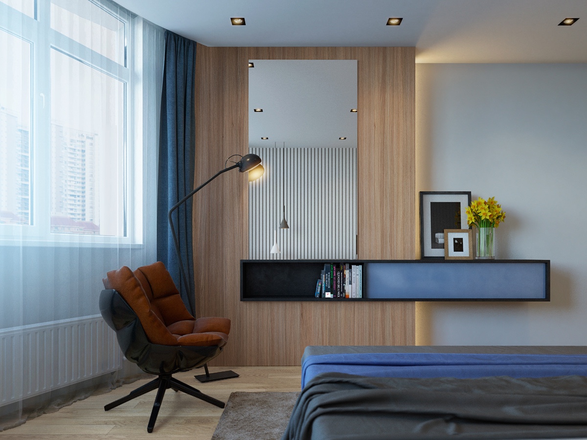 midnight-hued-bedroom-midnight-blue-duvet-dark-terracotta-feature-chair
