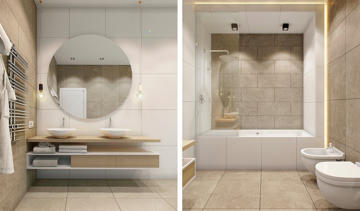 A zen-like bathroom uses minimalist materials to create a feeling of calm for the whole family. A large round feature mirror reflects the wall behind, giving the impression of more space while adding a central focus. Beige and white elements intersect each other in the shelving underneath, and the layout of the simplistic shower.