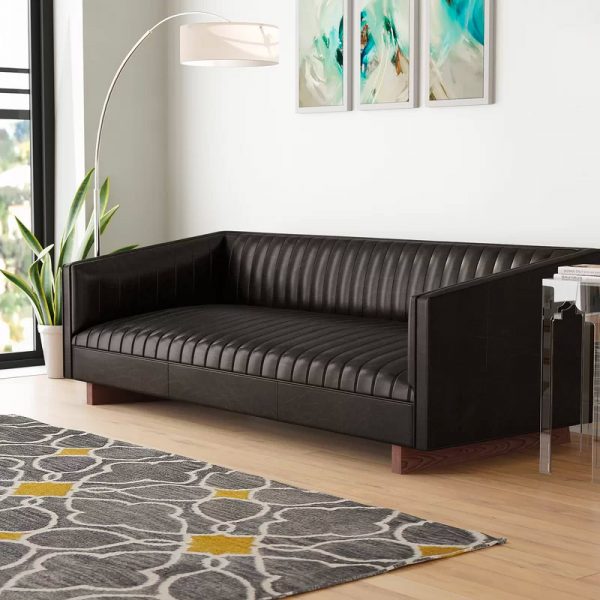 51 Tufted Sofas That Make Everyday, Byrdie Black Leather Modern Tufted Sofa